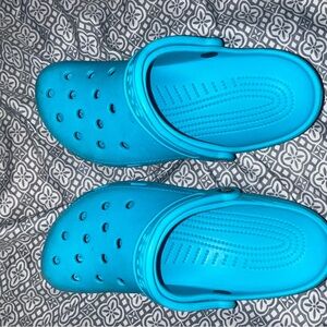 Teal crocs size 9 women’s